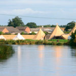 bell-tent-village-by-river-wedding